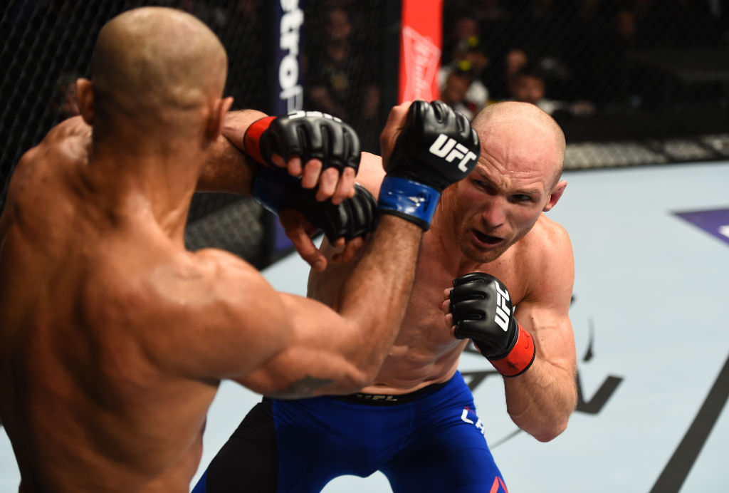 BROOKLYN, NEW YORK - FEBRUARY 11: (R-L) Ryan LaFlare punches Roan Carneiro of Brazil in their welterweight bout during the UFC 208 event inside Barclays Center on February 11, 2017 in Brooklyn, New York. (Photo by Jeff Bottari/Zuffa LLC)