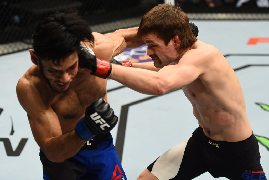 BROOKLYN, NEW YORK - FEBRUARY 11: (R-L) Rick Glenn punches Phillipe Nover in their featherweight bout during the UFC 208 event inside Barclays Center on February 11, 2017 in Brooklyn, New York. (Photo by Jeff Bottari/Zuffa LLC)