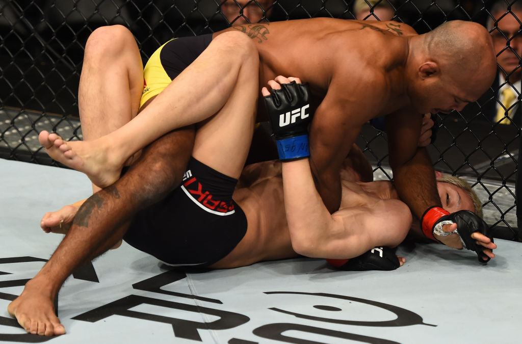 BROOKLYN, NEW YORK - FEBRUARY 11: (L-R) Wilson Reis of Brazil elbows Ulka Sasaki of Japan in their flyweight bout during the UFC 208 event inside Barclays Center on February 11, 2017 in Brooklyn, New York. (Photo by Jeff Bottari/Zuffa LLC)