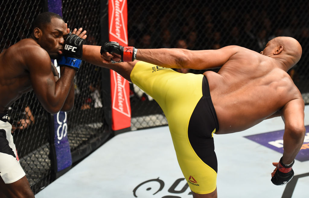 BROOKLYN, NEW YORK - FEBRUARY 11: (R-L) Anderson Silva of Brazil kicks Derek Brunson in their middleweight bout during the UFC 208 event inside Barclays Center on February 11, 2017 in Brooklyn, New York. (Photo by Jeff Bottari/Zuffa LLC/)