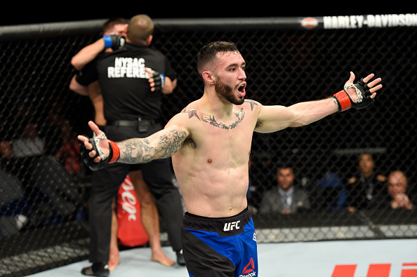 Shane Burgos celebrates after defeating Charles Rosa at UFC 210