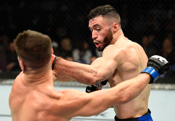 BUFFALO, NY - APRIL 08: Shane Burgos (R) lands a punch on Charles Rosa in their featherweight bout during the UFC 210 event at KeyBank Center on April 8, 2017 in Buffalo, New York. (Photo by Josh Hedges/Zuffa LLC)