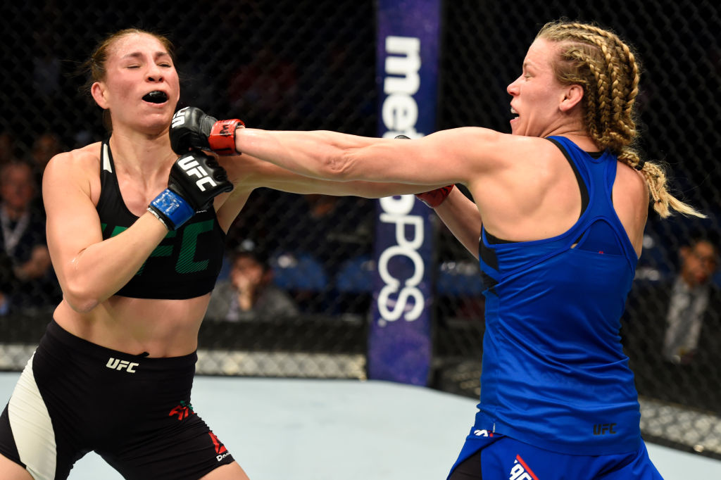 BUFFALO, NY - APRIL 08: Katlyn Chookagian (R) lands a punch on Irene Aldana of Mexico (L) in their women's bantamweight bout during the UFC 210 event at KeyBank Center on April 8, 2017 in Buffalo, New York. (Photo by Josh Hedges/Zuffa LLC)