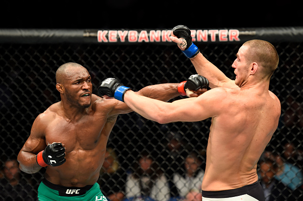 BUFFALO, NY - APRIL 08: Kamaru Usman of Nigeria (L) lands a punch on Sean Strickland in their welterweight bout during the UFC 210 event at KeyBank Center on April 8, 2017 in Buffalo, New York. (Photo by Josh Hedges/Zuffa LLC)