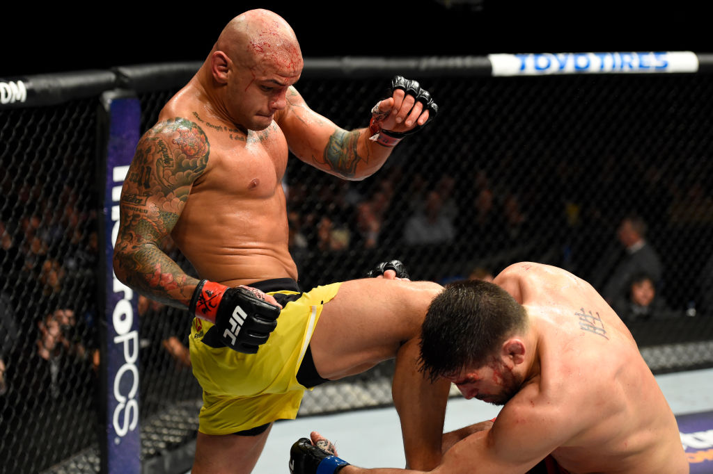 BUFFALO, NY - APRIL 08: Thiago Alves of Brazil (L) lands a kick on Patrick Cote of Canada in their welterweight bout during the UFC 210 event at KeyBank Center on April 8, 2017 in Buffalo, New York. (Photo by Josh Hedges/Zuffa LLC)