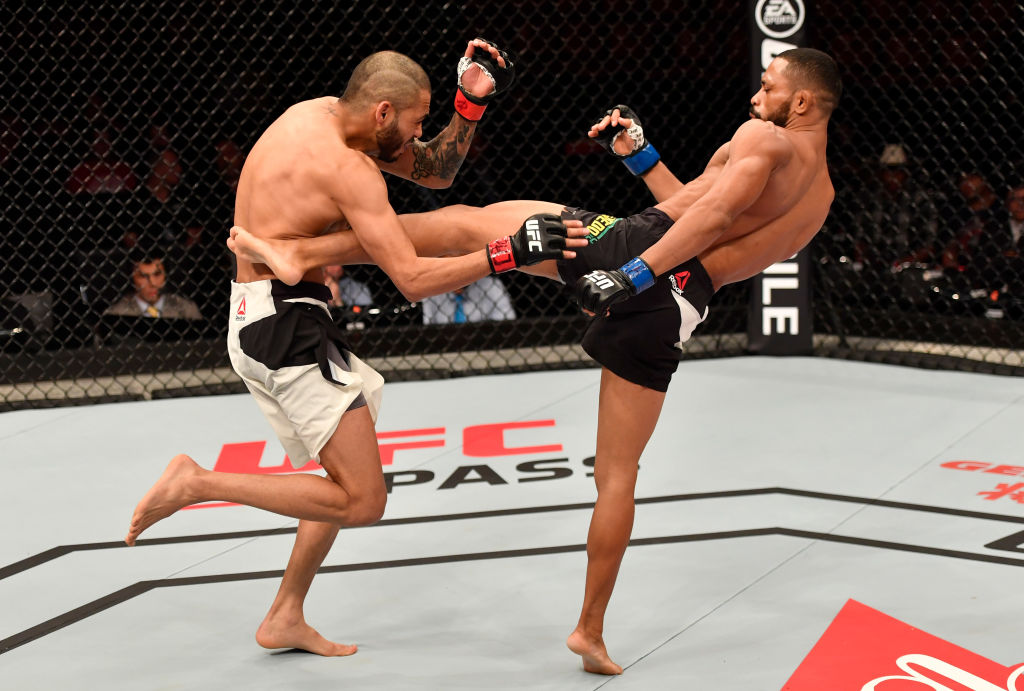 RIO DE JANEIRO, BRAZIL - JUNE 03: (R-L) Deiveson Figueiredo of Brazil kicks Marco Beltran of Mexico in their flyweight bout during the UFC 212 event at Jeunesse Arena on June 3, 2017 in Rio de Janeiro, Brazil. (Photo by Jeff Bottari/Zuffa LLC)