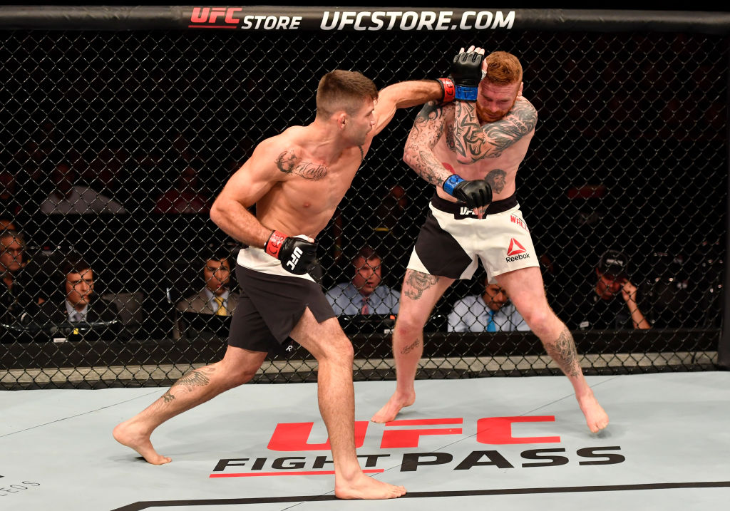 RIO DE JANEIRO, BRAZIL - JUNE 03: (L-R) Luan Chagas of Brazil punches Jim Wallhead of England in their welterweight bout during the UFC 212 event at Jeunesse Arena on June 3, 2017 in Rio de Janeiro, Brazil. (Photo by Jeff Bottari/Zuffa LLC)