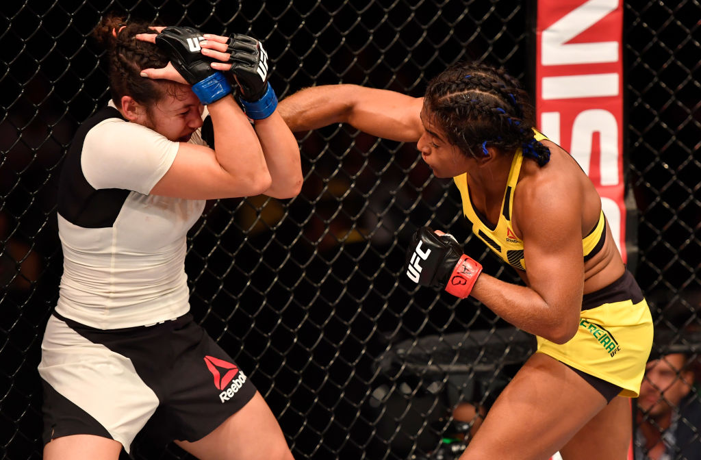 RIO DE JANEIRO, BRAZIL - JUNE 03: (R-L) Viviane Pereira of Brazil punches Jamie Moyle in their womens strawweight bout during the UFC 212 event at Jeunesse Arena on June 3, 2017 in Rio de Janeiro, Brazil. (Photo by Jeff Bottari/Zuffa LLC)