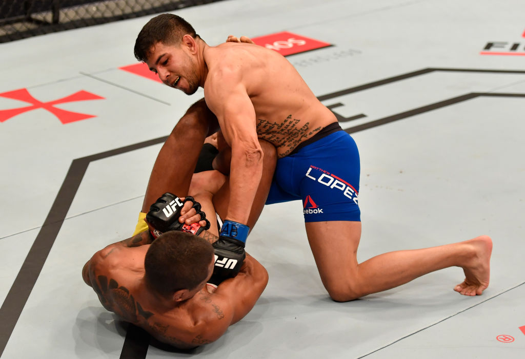 RIO DE JANEIRO, BRAZIL - JUNE 03: (R-L) Matthew Lopez punches Johnny Eduardo of Brazil in their bantamweight bout during the UFC 212 event at Jeunesse Arena on June 3, 2017 in Rio de Janeiro, Brazil. (Photo by Jeff Bottari/Zuffa LLC)