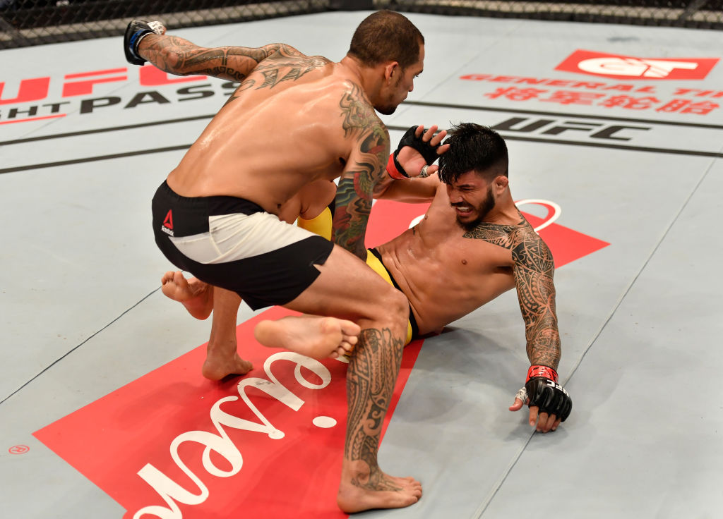 RIO DE JANEIRO, BRAZIL - JUNE 03: (L-R) Yancy Medeiros drops Erick Silva of Brazil with a punch in their welterweight bout during the UFC 212 event at Jeunesse Arena on June 3, 2017 in Rio de Janeiro, Brazil. (Photo by Jeff Bottari/Zuffa LLC)