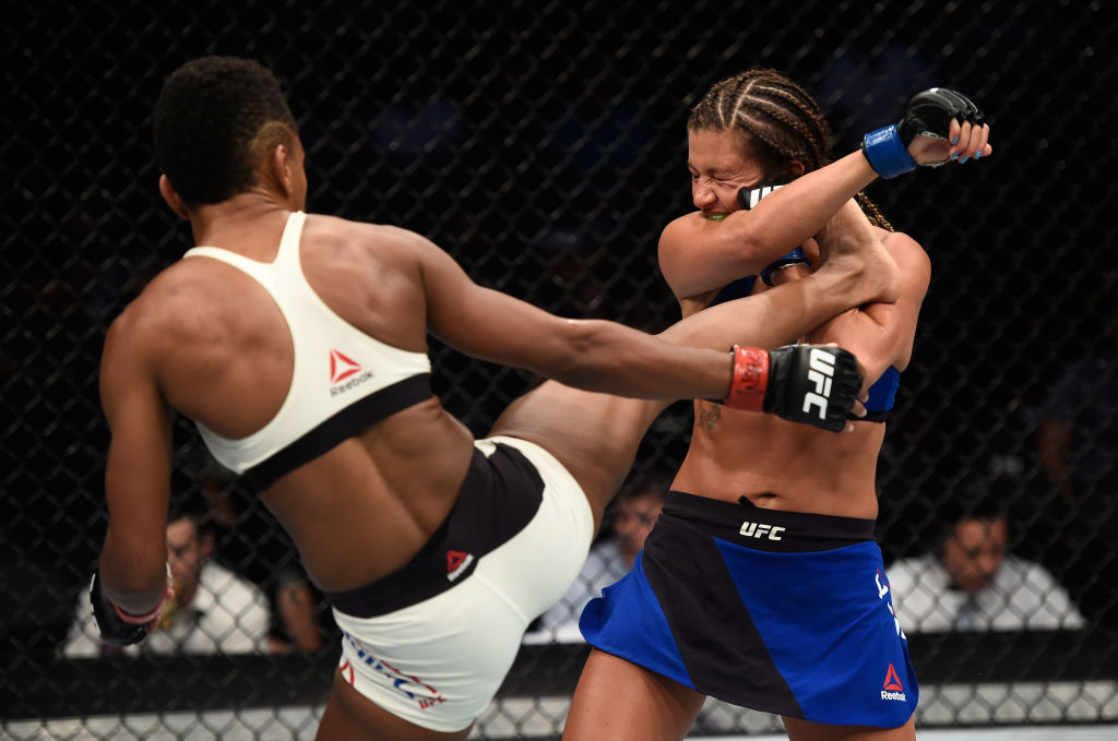 LAS VEGAS, NV - JULY 07: (L-R) Angela Hill kicks Ashley Yoder in their women's strawweight bout during The Ultimate Fighter Finale at T-Mobile Arena on July 7, 2017 in Las Vegas, Nevada. (Photo by Brandon Magnus/Zuffa LLC)