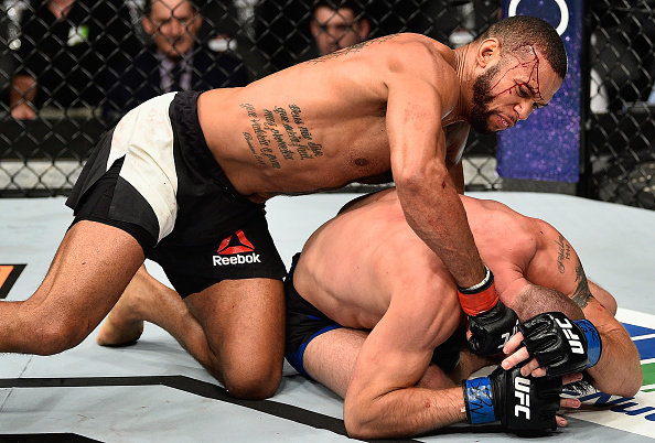 LAS VEGAS, NV - JULY 08: (L-R) Thiago Santos of Brazil punches Gerald Meerschaert in their middleweight bout during the UFC 213 event at T-Mobile Arena on July 8, 2017 in Las Vegas, Nevada. (Photo by Jeff Bottari/Zuffa LLC/Zuffa LLC via Getty Images)