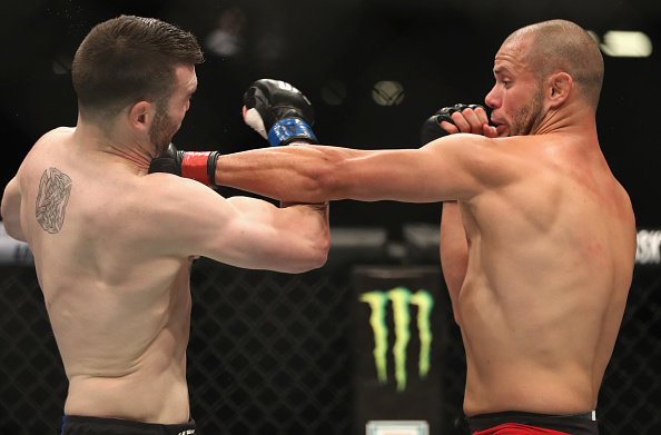 LAS VEGAS, NV - JULY 08: (R-L) Chad Laprise of Canada punches Brian Camozzi in their welterweight bout during the UFC 213 event at T-Mobile Arena on July 8, 2017 in Las Vegas, Nevada. (Photo by Christian Petersen/Zuffa LLC/Zuffa LLC via Getty Images)