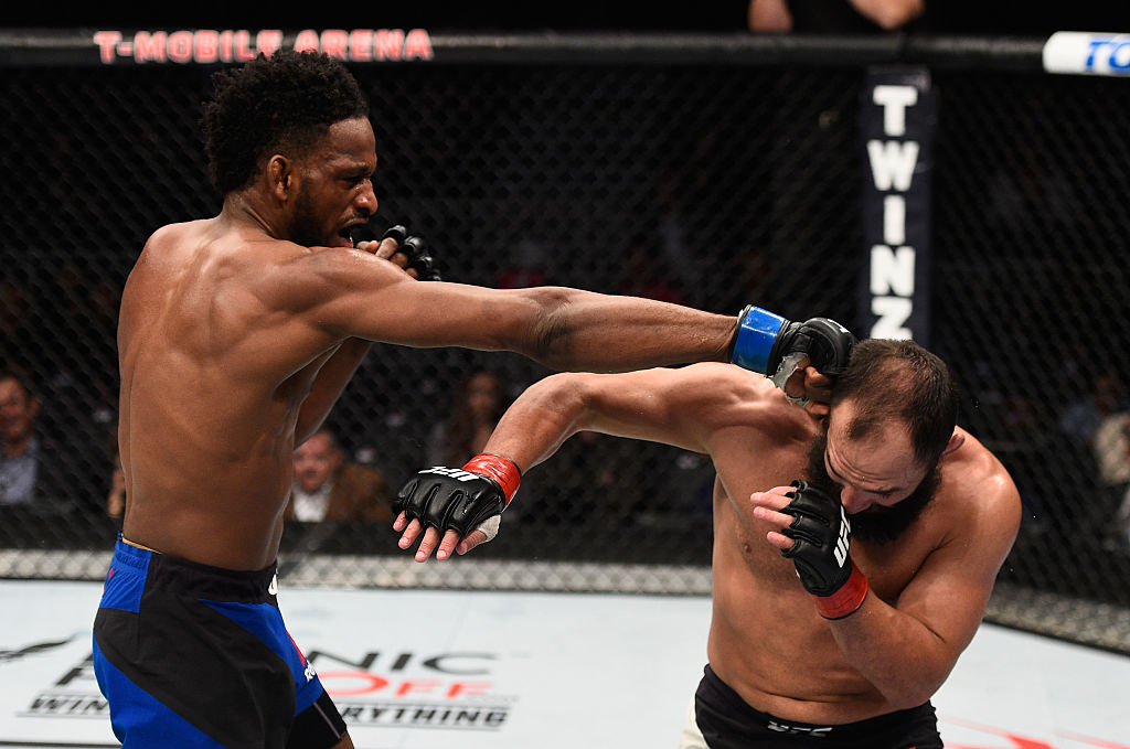 LAS VEGAS, NV - DECEMBER 30: (L-R) Neil Magny punches <a href='../fighter/Johny-Hendricks'>Johny Hendricks</a> in their welterweight bout during the UFC 207 event at T-Mobile Arena on December 30, 2016 in Las Vegas, Nevada. (Photo by Jeff Bottari/Zuffa LLC)