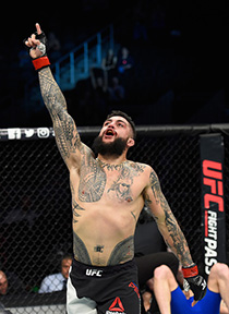 LAS VEGAS, NV - MARCH 04: Tyson Pedro of Australia reacts to his victory over <a href='../fighter/paul-craig'>Paul Craig</a> of Scotland in their light heavyweight bout during the UFC 209 event at T-Mobile Arena on March 4, 2017 in Las Vegas, Nevada. (Photo by Josh Hedges/Zuffa LLC)