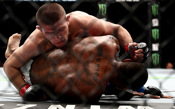 Khabib Nurmagomedov (top) fights against Michael Johnson during UFC 205 event at Madison Square Garden on November 12, 2016 in New York City. (Photo by Al Bello/Zuffa LLC)