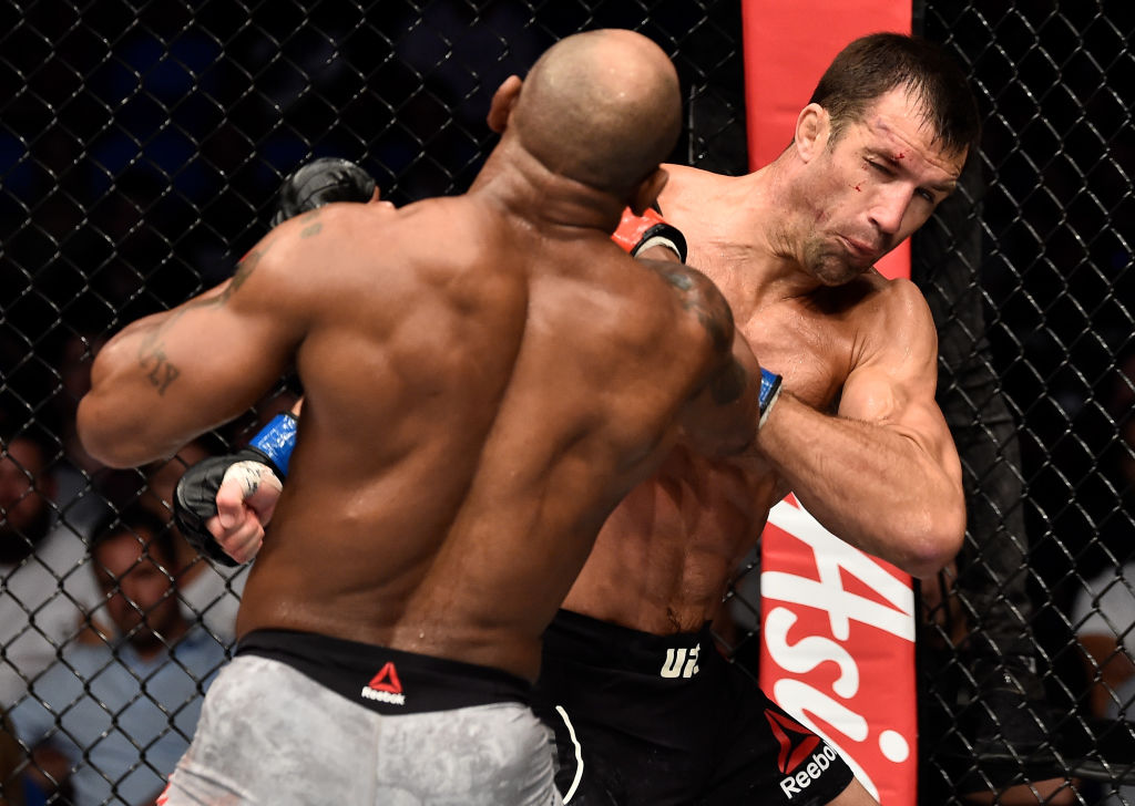 PERTH, AUSTRALIA - FEBRUARY 11: (L-R) Yoel Romero of Cuba punches Luke Rockhold in their interim middleweight title bout during the UFC 221 event at Perth Arena on February 11, 2018 in Perth, Australia. (Photo by Jeff Bottari/Zuffa LLC)