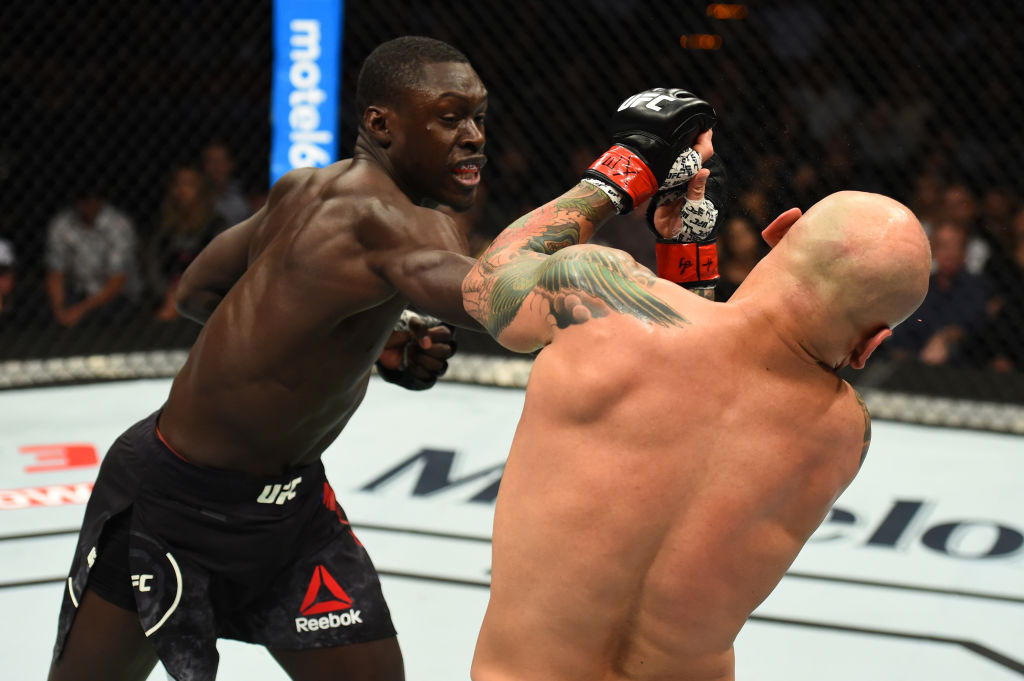 Curtis Millender (L) punches Thiago Alves during the UFC Fight Night event at Frank Erwin Center on February 18, 2018 in Austin, Texas. (Photo by Josh Hedges/Zuffa LLC)