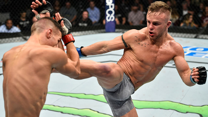 LAS VEGAS, NV - OCTOBER 07: (R-L) Cody Stamann kicks Tom Duquesnoy of France in their bantamweight bout during the UFC 216 event inside T-Mobile Arena on October 7, 2017 in Las Vegas, Nevada. (Photo by Jeff Bottari/Zuffa LLC)