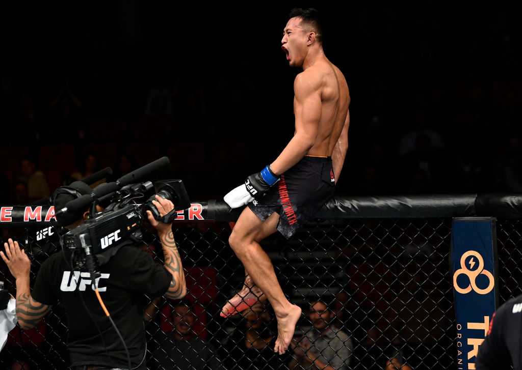 <a href='../fighter/Andre-Soukhamthath'>Andre Soukhamthath</a> celebrates his victory over <a href='../fighter/Luke-Sanders'>Luke Sanders</a> during the <a href='../event/UFC-Silva-vs-Irvin'>UFC Fight Night </a>event on December 9, 2017 in Fresno, CA. (Photo by Jeff Bottari/Zuffa LLC)