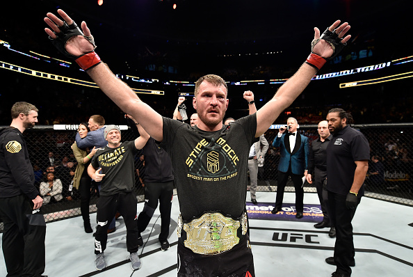  <a href='../fighter/Stipe-Miocic'>Stipe Miocic</a> celebrates after his unanimous-decision victory over <a href='../fighter/francis-ngannou'>Francis Ngannou</a> of Cameroon in their heavyweight championship bout during the UFC 220 event at TD Garden on January 20, 2018 in Boston, Massachusetts. (Photo by Jeff Bottari/Zuffa LLC/Zuffa LLC via Getty Images)