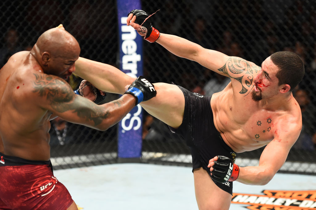 Robert Whittaker lands a kick to the head of <a href='../fighter/Yoel-Romero'>Yoel Romero</a> at UFC 225 (Photo by Josh Hedges/Zuffa LLC)
