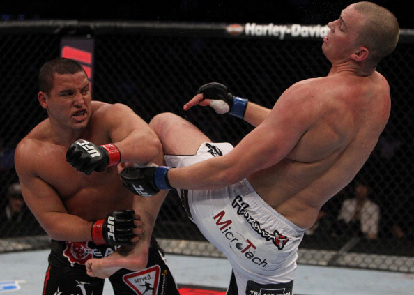 Barry avoids a knee from Struve Barry avoids a knee from Struve