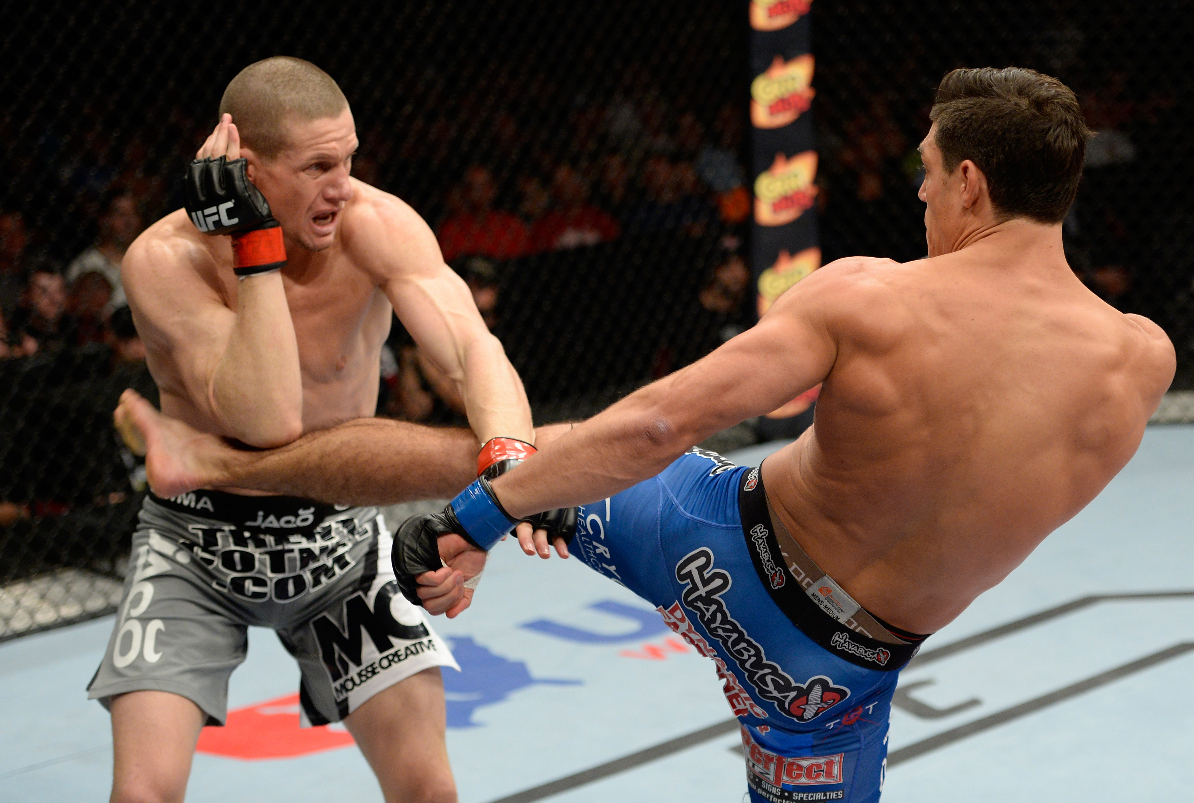 Jouban lands a leg kick Jouban lands a leg kick