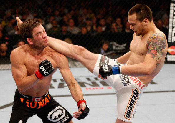 Krause head kick against Stout Krause head kick against Stout