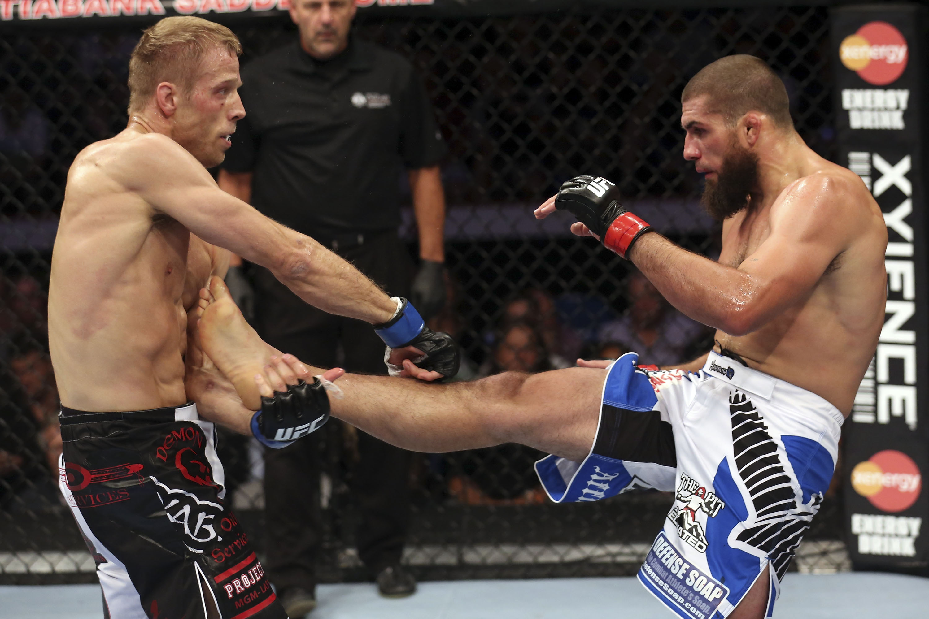 McGee blocks a kick from Nick Ring McGee blocks a kick from Nick Ring