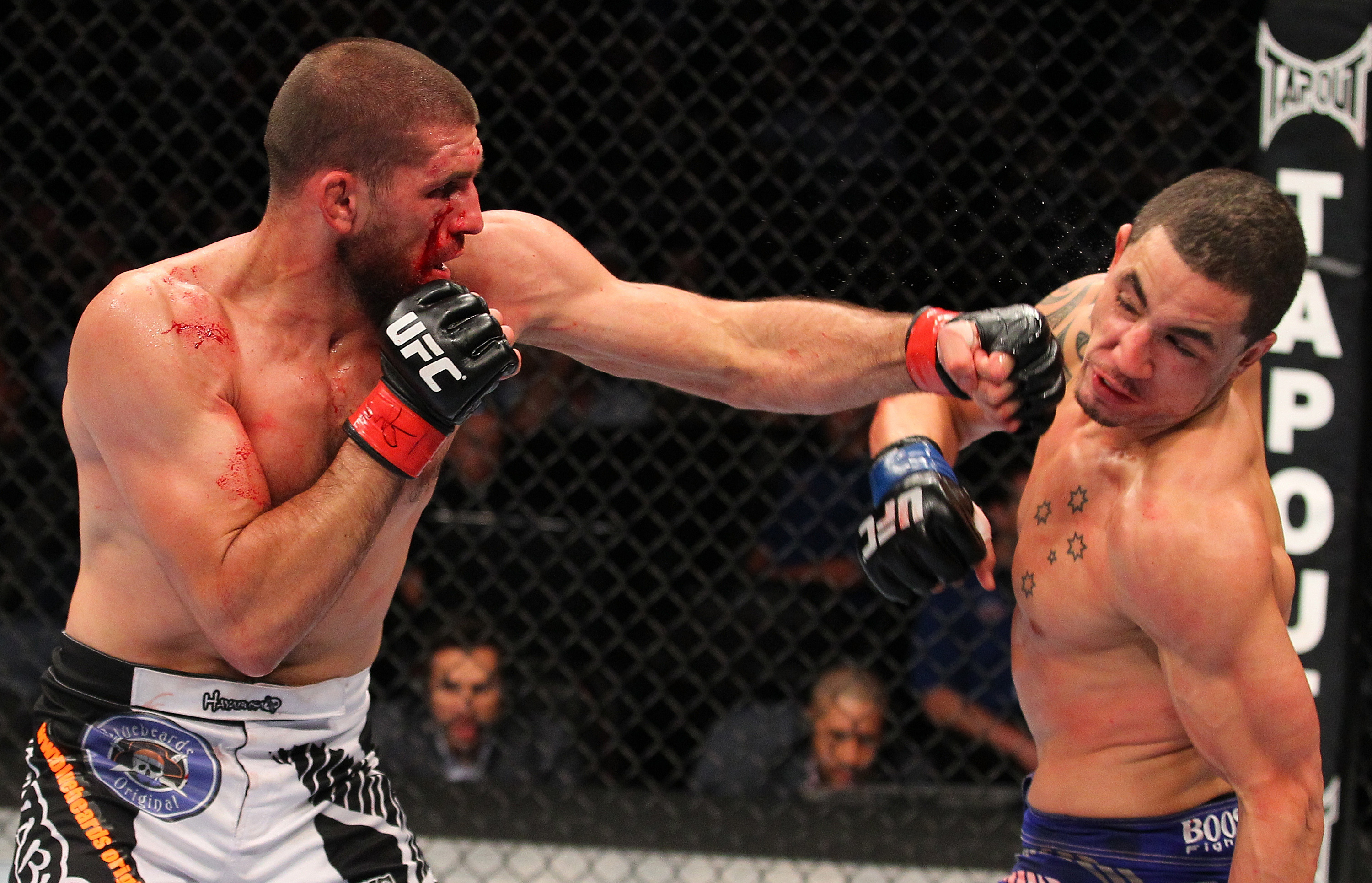 McGee lands a big shot against Whittaker McGee lands a big shot against Whittaker
