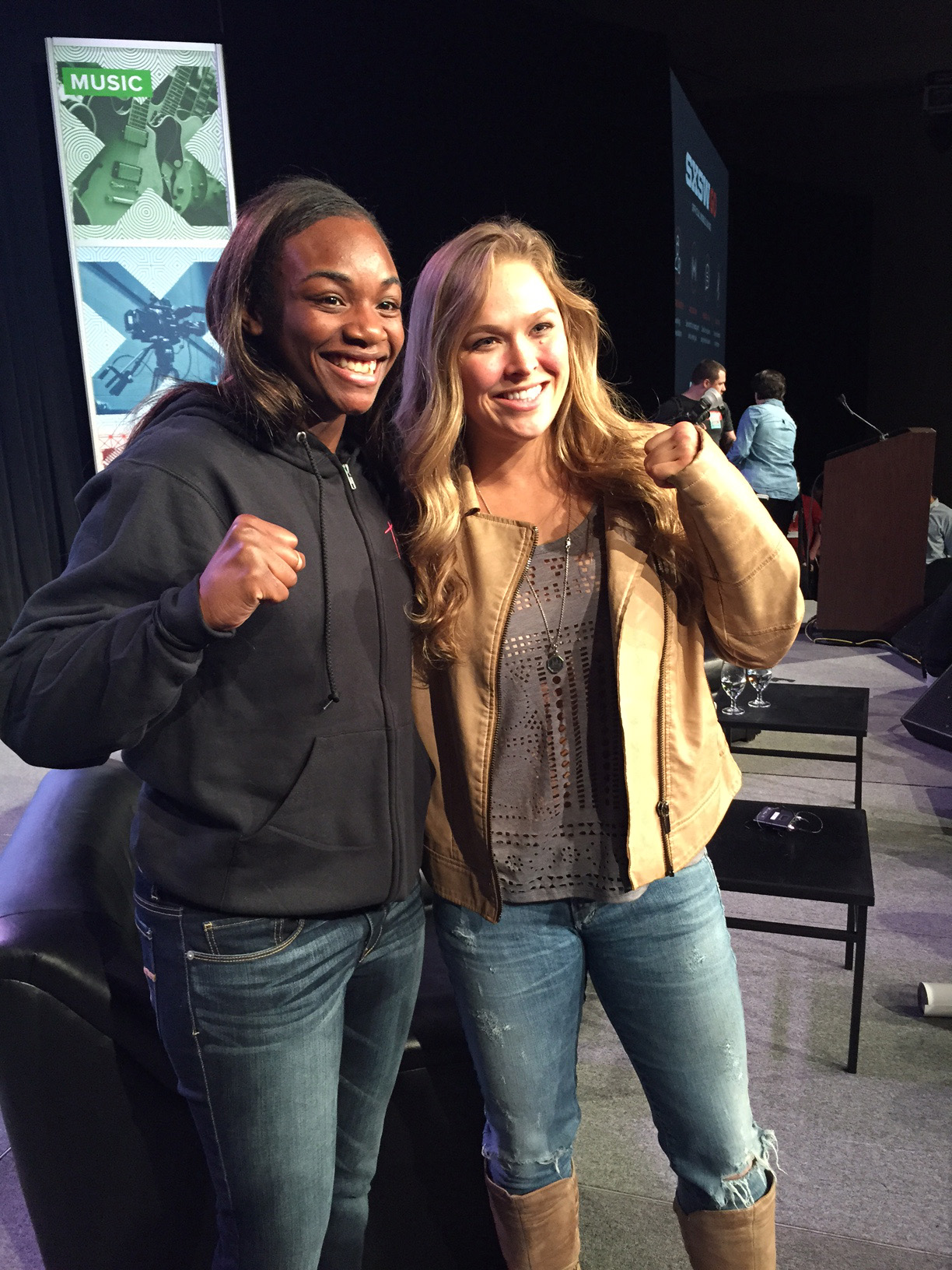 Olympic gold medalist Claressa Shields (L) and Ronda Rousey