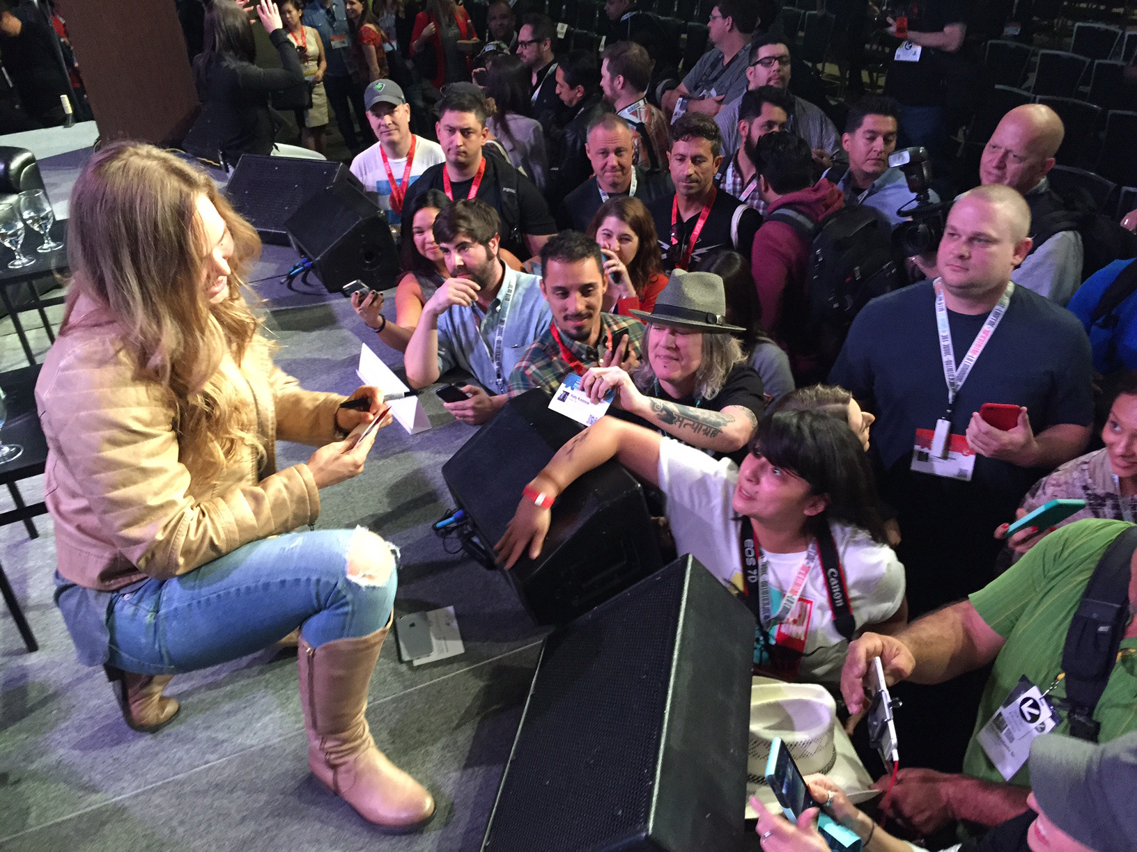 Rousey signs autographs for fans