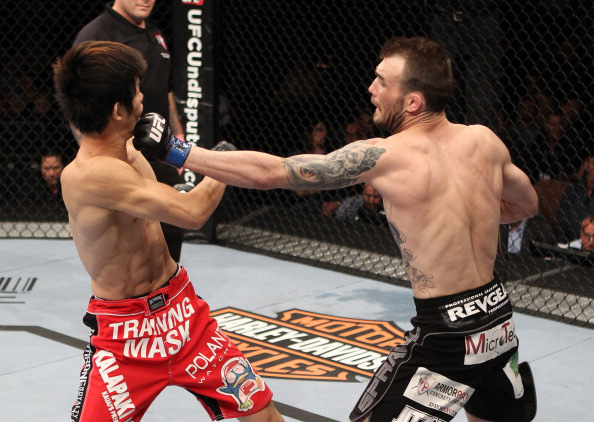Roop lands a punch against Hioki Roop lands a punch against Hioki