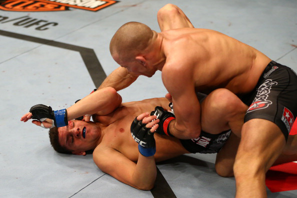 St-Pierre punches Diaz St-Pierre punches Diaz