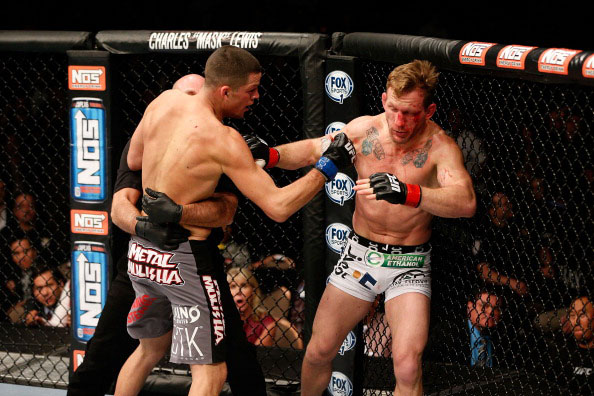 Diaz is pulled off a dazed Maynard Diaz is pulled off a dazed Maynard