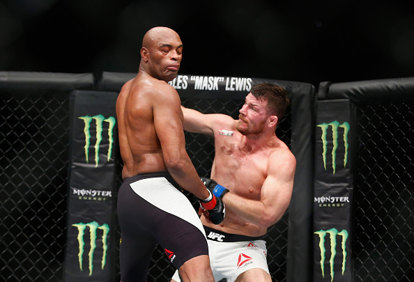 Michael Bisping punches Anderson Silva during Fight Night London in 2016