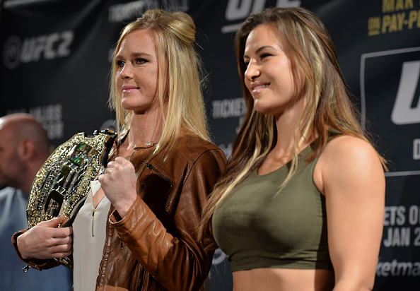 (L-R) UFC bantamweight champion Holly Holm and Miesha Tate pose for a picture during the UFC 197 on-sale press conference event inside MGM Grand Hotel & Casino on January 20, 2016 in Las Vegas, Nevada. (Photo by Brandon Magnus/Zuffa LLC)