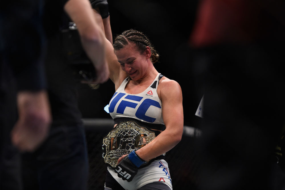 Miesha Tate achieved her dream at UFC 196 and became the UFC women's bantamweight champion when she upset <a href='../fighter/holly-holm'>Holly Holm</a>