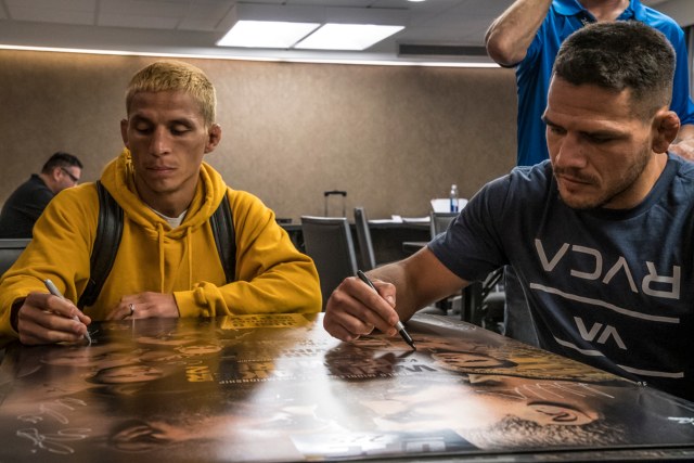 Benavidez (left) with <a href='../fighter/Rafael-Dos-Anjos'>Rafael dos Anjos</a> at UFC 225 check-ins in Chicago (Photo by Juan Cardenas/Zuffa LLC)