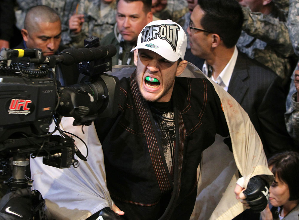 Cole Miller enters the arena.