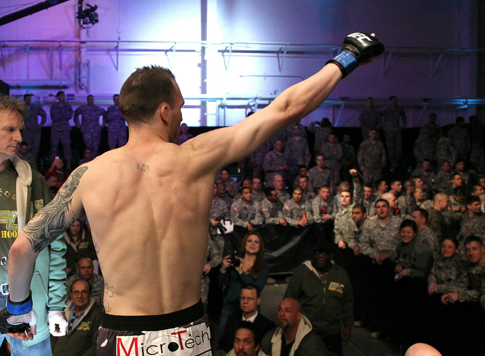 George Roop enters the octagon.