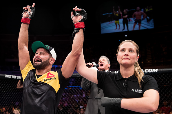 Jussier Formiga of Brazil celebrates victory over <a href='../fighter/Dustin-Ortiz'>Dustin Ortiz</a> of the United States in their bantamweight UFC bout during the UFC Fight Night event at Nilson Nelson gymnasium on September 24, 2016 in Brasilia, Brazil. (Photo by Buda Mendes/Zuffa LLC)