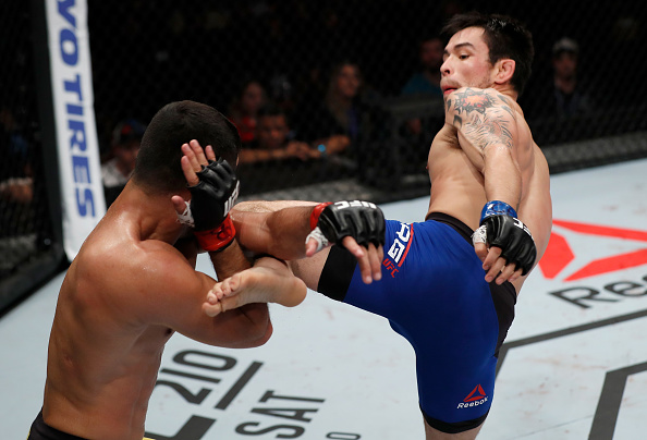 (R-L) Ray Borg kicks <a href='../fighter/jussier-formiga'><a href='../fighter/jussier-formiga'>Jussier Formiga</a></a> of Brazil in their flyweight bout during the <a href='../event/UFC-Silva-vs-Irvin'><a href='../event/UFC-Silva-vs-Irvin'>UFC Fight Night </a></a>event at CFO - Centro de Forma�co Olimpica on March 11, 2017 in Fortaleza, Brazil. (Photo by Buda Mendes/Zuffa LLC)