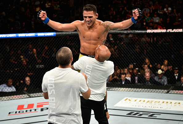 EDMONTON, AB - SEPTEMBER 09: <a href='../fighter/Rafael-Dos-Anjos'>Rafael Dos Anjos</a> of Brazil celebrates his submission victory over <a href='../fighter/Neil-Magny'>Neil Magny</a> in their welterweight bout during the UFC 215 event inside the Rogers Place on September 9, 2017 in Edmonton, Alberta, Canada. (Photo by Jeff Bottari/Zuffa LLC)