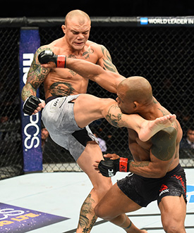 (L-R) <a href='../fighter/Anthony-Smith'>Anthony Smith</a> kicks <a href='../fighter/Hector-Lombard'>Hector Lombard</a> of Cuba in their middleweight bout during the UFC Fight Night event inside the PPG Paints Arena on September 16, 2017 in Pittsburgh, Pennsylvania. (Photo by Josh Hedges/Zuffa LLC)