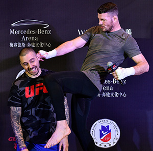 (L-R) <a href='../fighter/Dan-Hardy'>Dan Hardy</a> 'speaks' with Michael Bisping of England after his open workout session inside the Kerry Hotel Pudong on Nov. 23, 2017 in Shanghai, China. (Photo by Brandon Magnus/Zuffa LLC)