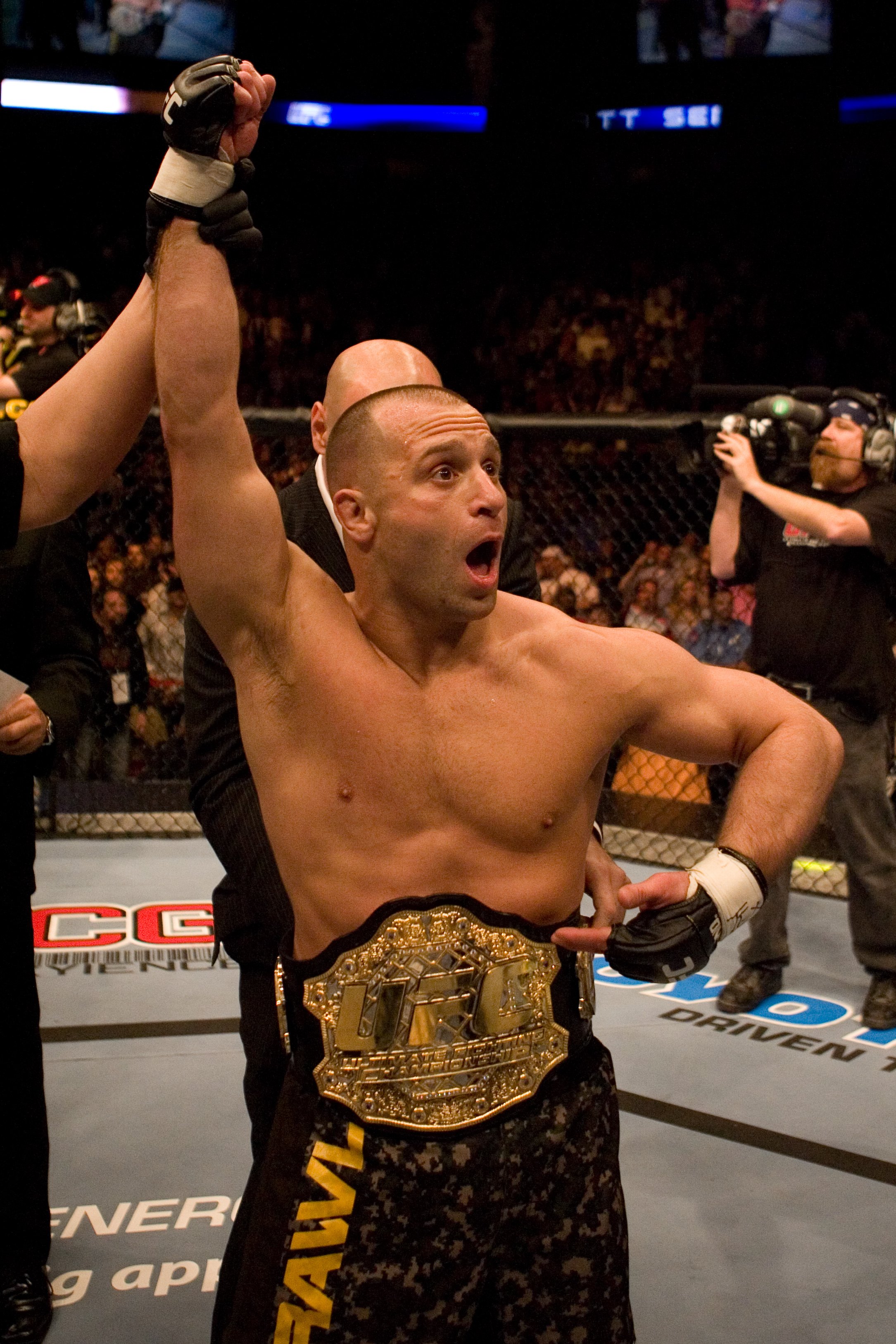 HOUSTON - APRIL 7: Matt Serra (brown/camo shorts) def. Georges St-Pierre (green shorts) - TKO - 3:25 round 1 during UFC 69 at Toyota Center on April 7, 2007 in Houston, Texas. (Photo by Josh Hedges/Zuffa LLC)