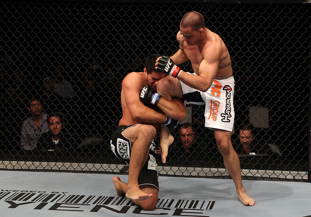 DENVER, CO - SEPTEMBER 24: (L-R) Ricardo Romero attempts to take down James Te Huna during the UFC 135 event at the Pepsi Center on September 24, 2011 in Denver, Colorado. (Photo by Jed Jacobsohn/Zuffa LLC)