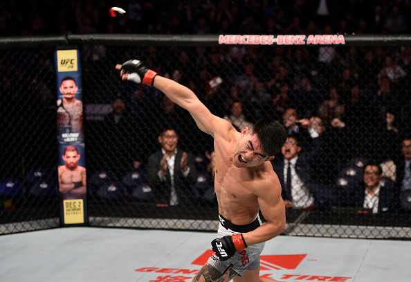SHANGHAI, CHINA - NOVEMBER 25: <a href='../fighter/Yadong-Song'>Song Yadong</a> of China celebrates after his victory over <a href='../fighter/Bharat-Kandare'>Bharat Kandare</a> in their featherweight bout during the <a href='../event/UFC-Silva-vs-Irvin'>UFC Fight Night </a>event inside the Mercedes-Benz Arena on November 25, 2017 in Shanghai, China. (Photo by Brandon Magnus/Zuffa LLC via Getty Images)